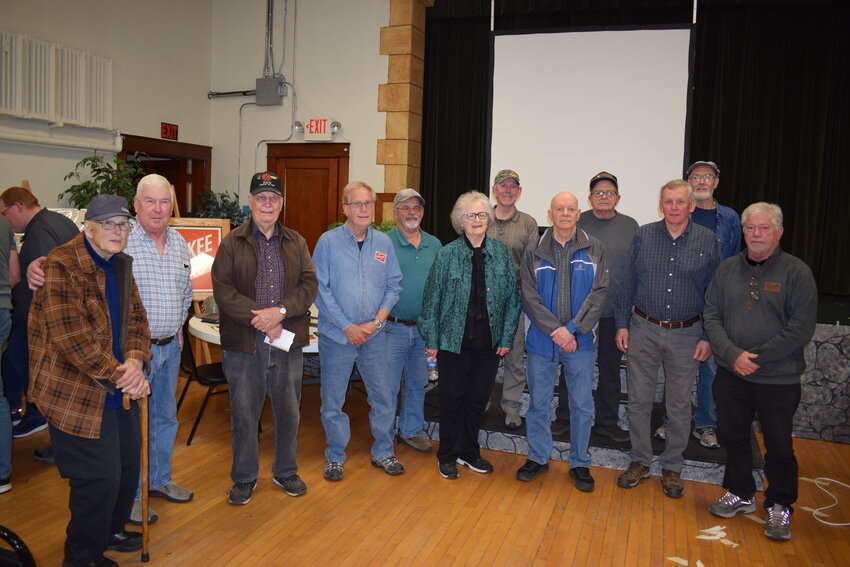 Former Tomah Railroad shop employees gather to share their memories during a presentation by Monroe County Local History Room director, Jarrod Roll.