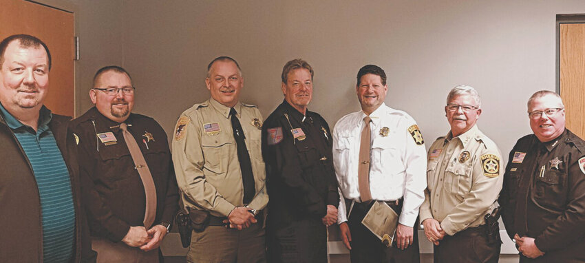 Pictured above, from the left, are WCMEG Coordinator – Investigator Rob Walensky, Jackson County Sheriff – Duane Waldera, Trempealeau County Sheriff – Brett Semingson, Crawford County Sheriff – Dale McCullick, La Crosse County Sheriff – John Siegel, Monroe County Sheriff – Wes Revels, and Vernon County Sheriff – Roy Torgerson. Together, the sheriffs make up the WCMEG Board of Directors. They have strength in numbers and funding, allowing for stronger and more aggressive actions against the criminal activities of the evil elements that seek to destroy communities and obliterate families. Herald photo by Benny Mailman.