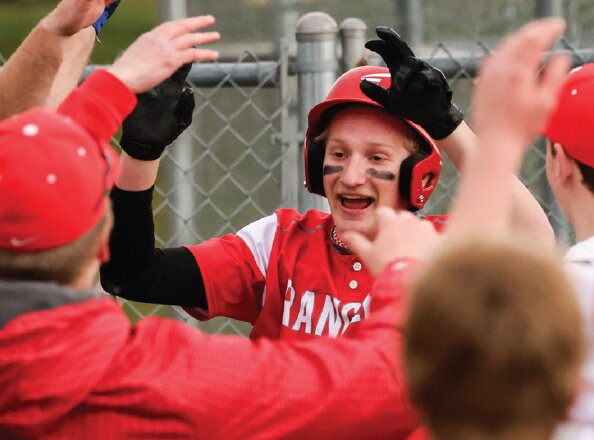 La Crosse Logan&rsquo;s Carson Nelson is greeted in the dugout after scoring a run in a game earlier this spring. Logan qualified for state for the first time since 2007 after winning the Baldwin-Woodville sectional last week.