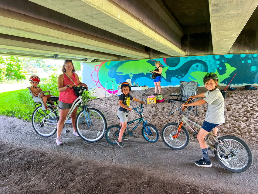 Elizabeth cycled by- and, inspired, stopped to help with her family.