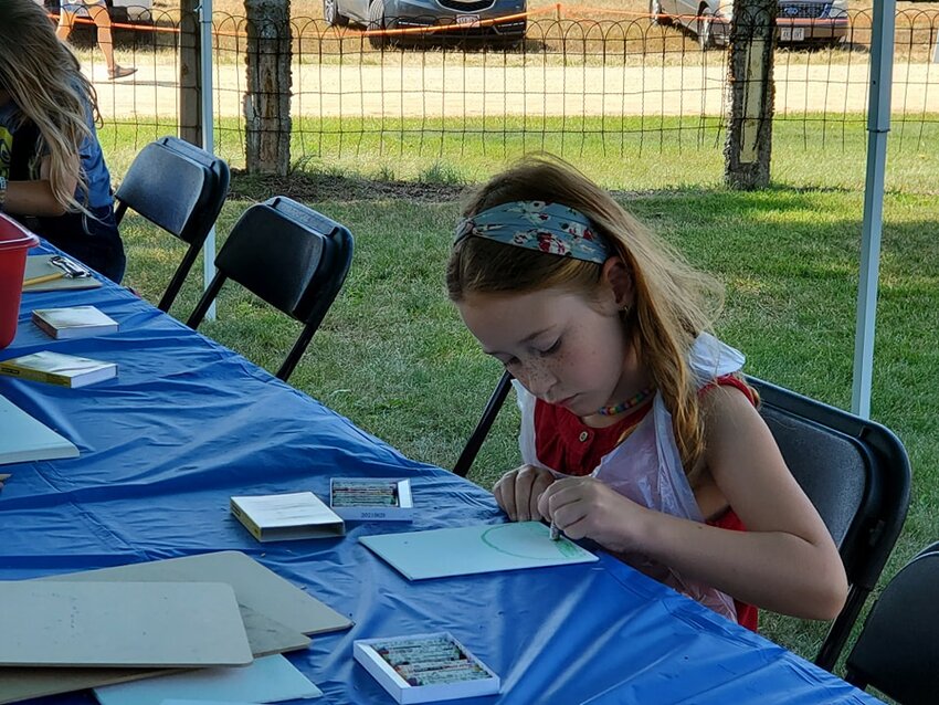 Very special guests showed up at the Wegner Grotto's Outdoor Art event on Saturday, August 24th, 2024. Pictured here, working on pastel painting, is Evelyn - a descendant of Paul and Matilda Wegner, the creators of the grotto.