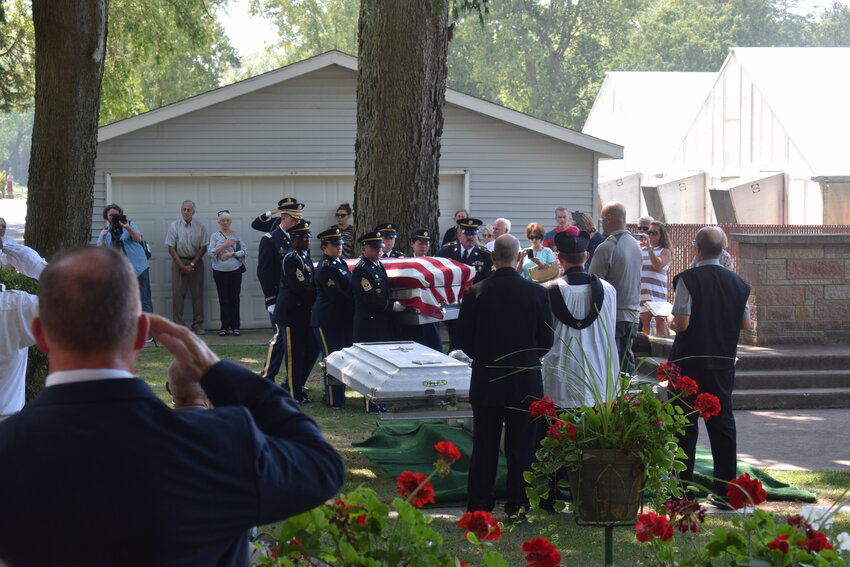 Full military honors are accorded to Sergeant Jack Hohlfeld as he is laid to rest at the Catholic Cemetery in La Crosse.