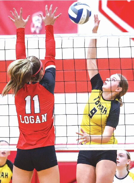 Tomah’s Cora Vitcenda reaches to meet ball, driving it past La Crosse Logan’s Sophie Schmitz during last week’s MVC meeting.