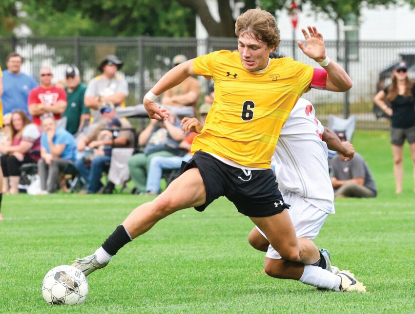 Tomah’s Dane Vervoren takes a stab at a ball as the Timberwolves pressure the Arcadia defense in the first half of
Thursday’s Mississippi Valley Conference game. Vervoren finished with an assist in a 4-1 win over the visiting Raiders.