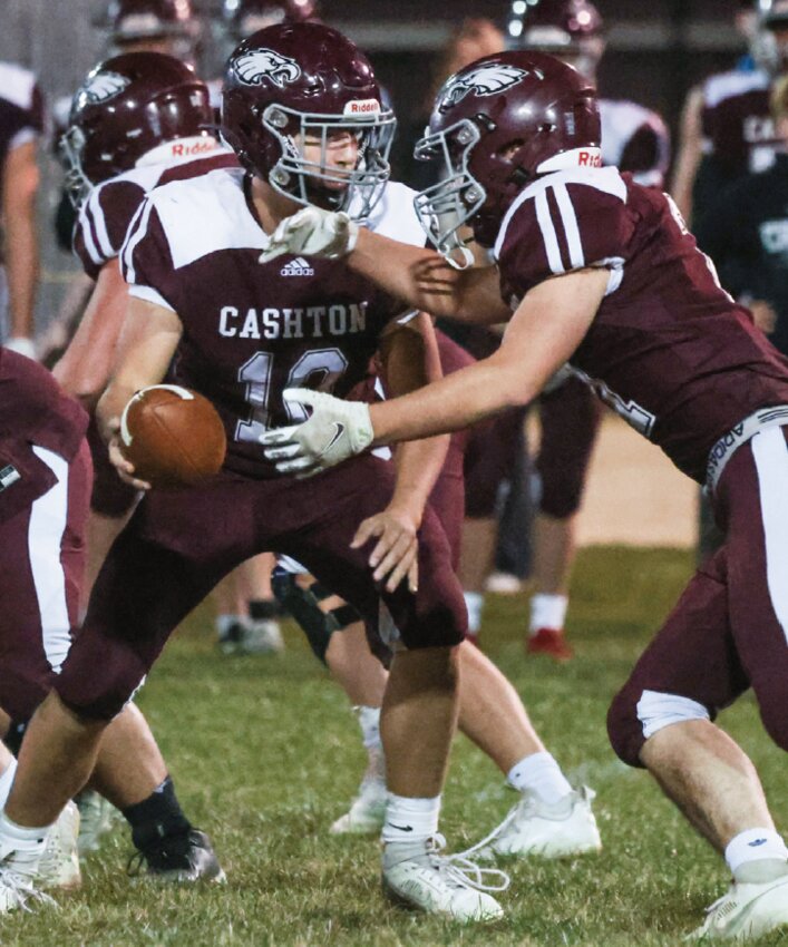 Cashton’s Rory Mlsna prepares to hand the ball
off during Friday’s game with Bangor. Mlsna and
the Eagles can earn a spot in the playoffs with a
win at Hillsboro this week.