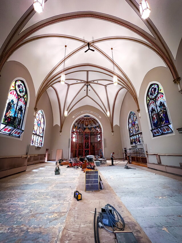 A project that began as a means to create more seating space at St Pat’s church in Soarta has evolved into something far greater, involving carpentry, the refinishing of pews, the restoration of stained glass, the painting of ceilings and walls, and even a sweeping new heavenly painting above the altar. P