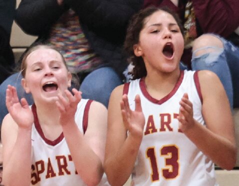 Kaylie Church, Tiana Leis, Sparta.  The Spartans head to Holmen  Tuesday to face the third place  Vikings as MVC play nears its final  week of play.