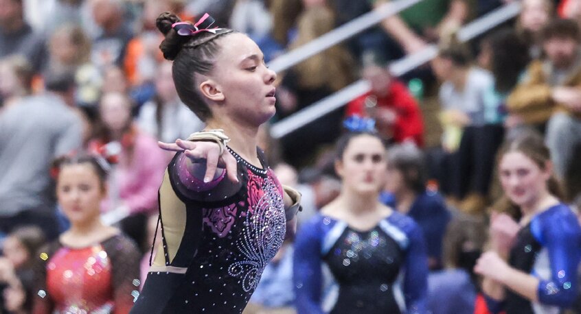 Westby’s Isabell Korn performs her floor routine at the WIAA state meet. Korn finished third with a score of 9.45.