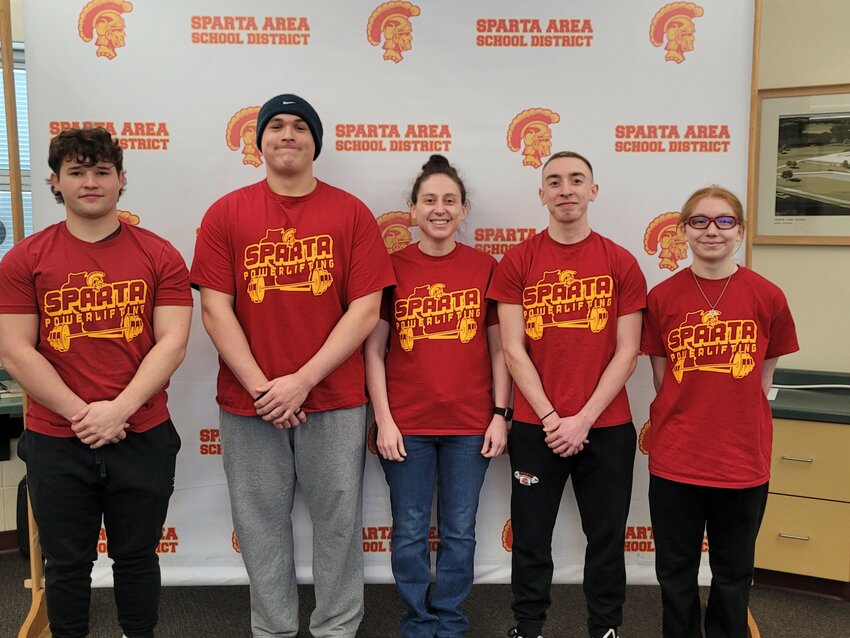 The Sparta High School 2024-2025 Powerlifting Team. Top (L to R): Austin Goodenough, Angel Montoya, Allie Martinson, 3rd Row (L to R): Coach Jennifer Kondor, Logan Fish, Manager Keli Castro Bautista, Karen Gonzalez. 2nd Row (L to R): Eli Kemp, Lucah Gomez, Brayden Ward, Camden McTaggart, Carter Deal, 1st Row (L to R): Anna Osmond, Jessie Kondor.