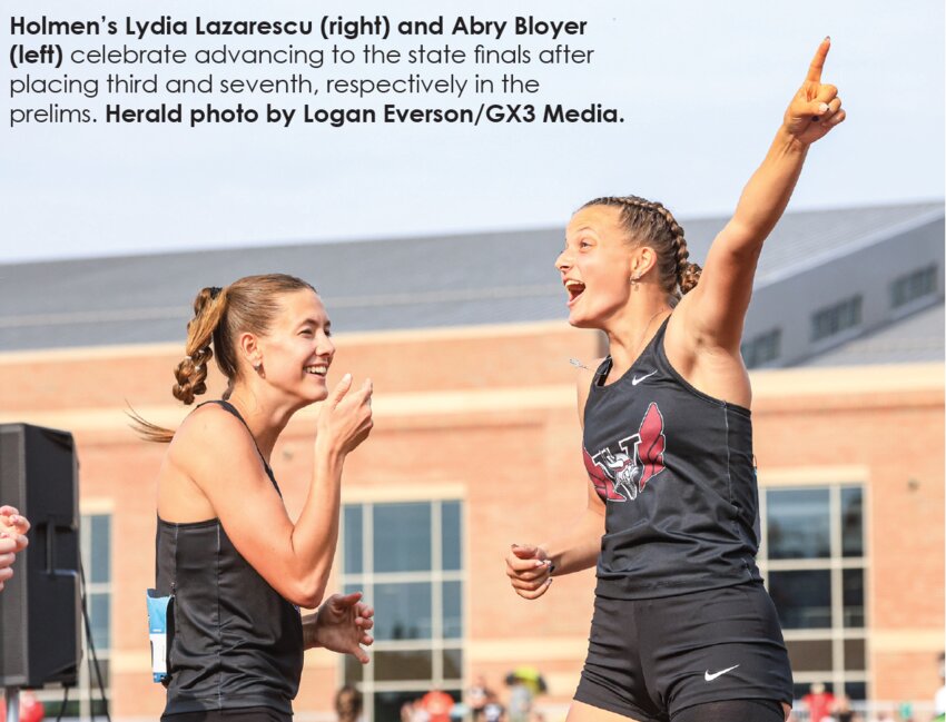 Holmen’s Lydia Lazarescu (right) and Abry Bloyer
(left) celebrate advancing to the state finals after
placing third and seventh, respectively in the
prelims.