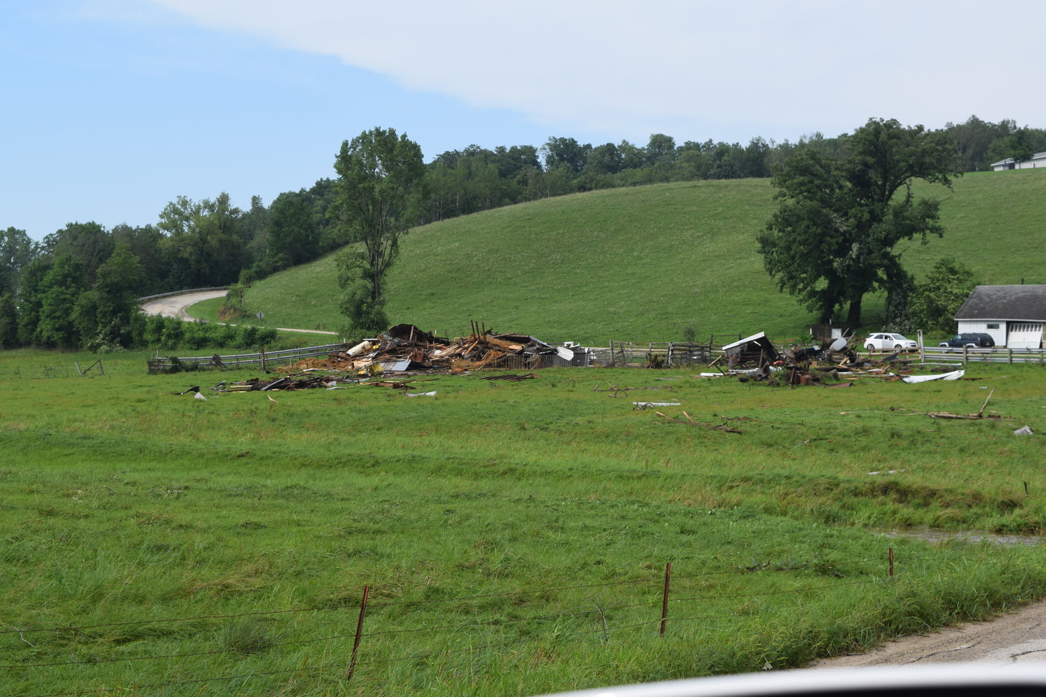 An EF1 tornado off Cty. Hwy. T north of Norwalk destroyed this barn belonging to Joe Hansen Wednesday afternoon.