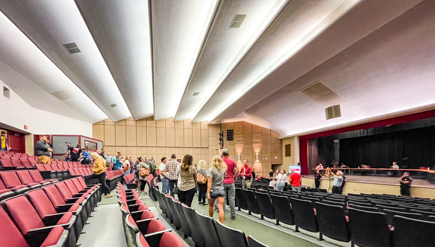 Officers with the Sparta Police Department created a barrier between the outraged crowd and Sparta School Board members after the board voted Wednesday to reinstate a mask mandate. 