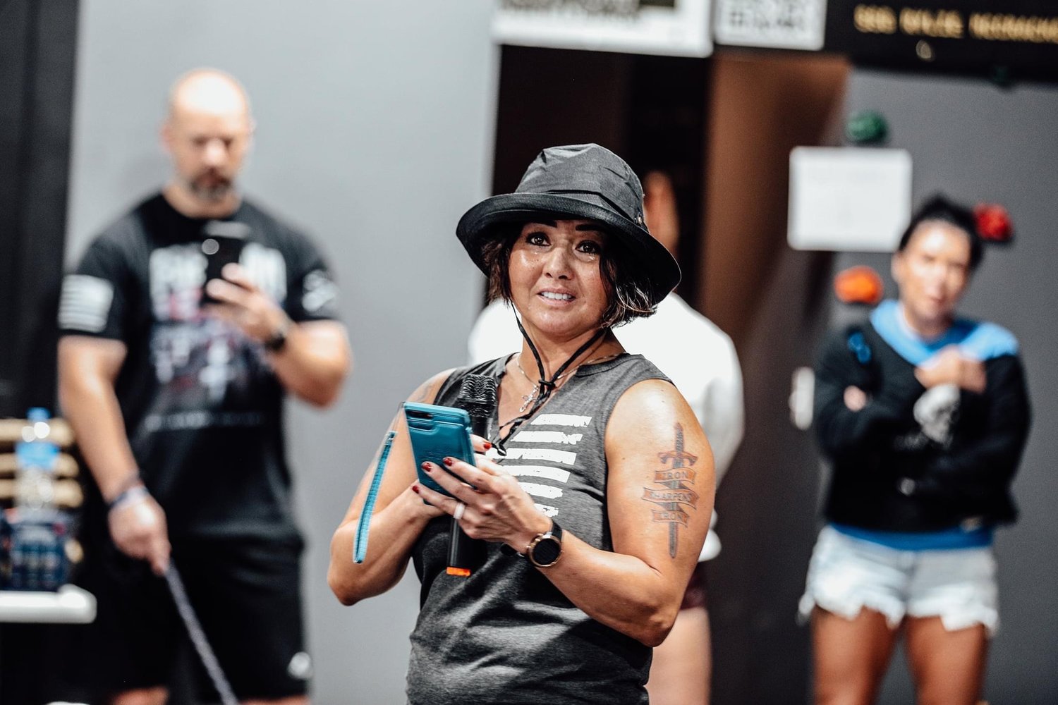 Captain Hedy Vincent is pictured welcoming the competitors, judges and spectators at the Hedstrong Throwdown, a fundraising competition held at Hoplite CrossFit in Sparta.
