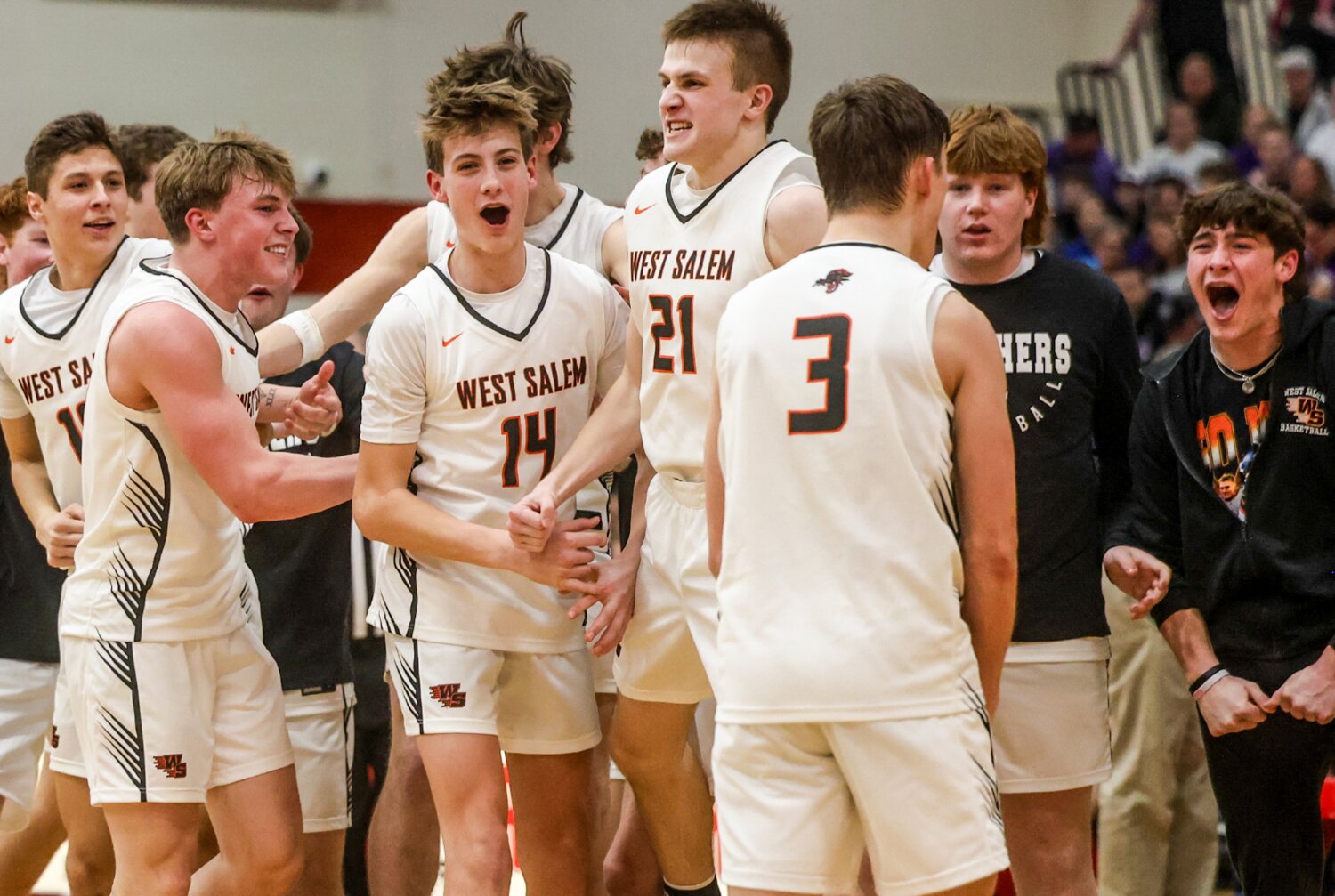 West Saelm’s team comes together after notching a 77-73 win over Onalaska in Thursday’s D2 sectional semifinal game. The Panthers faced a 21-point deficit in the first half, but rallied back to lead before being forced into overtime.