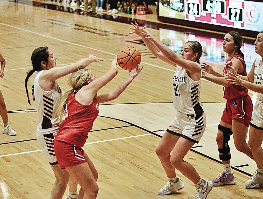 Brooklinn McCartney battles a Green Forest player.