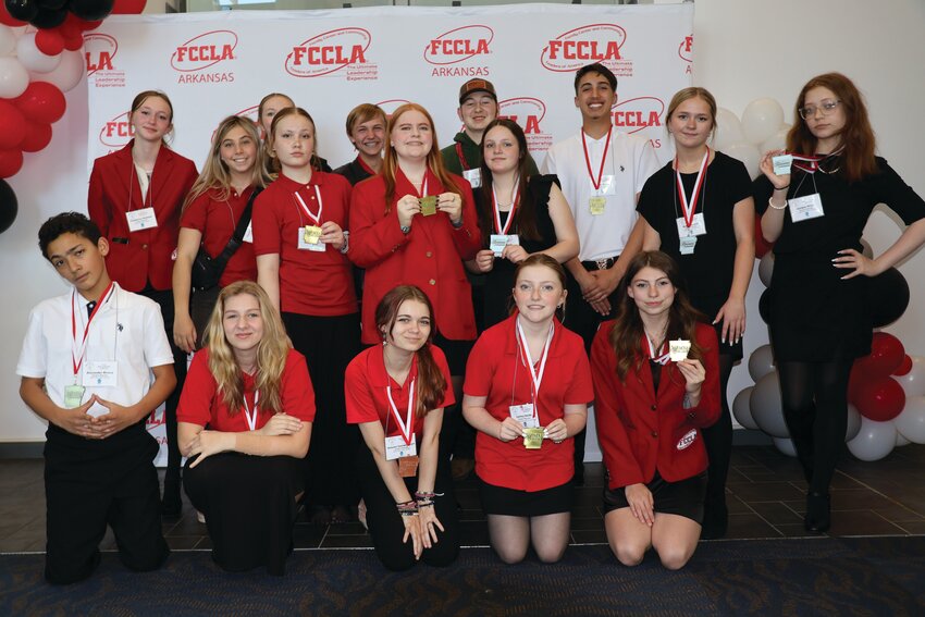 From left, Kate Wasson, Kylie Keck and Juniper Block display their awards in Promote and Publicize FCCLA.