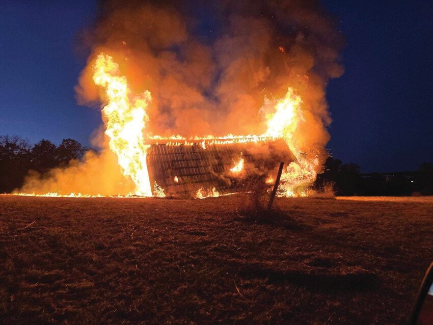 This barn was fully engulfed in flames when firefighters arrived on the scene.