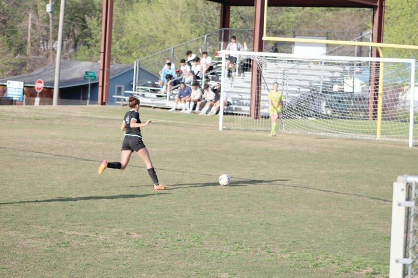 Huntsville’s Emaline Henry breaks on the goal. Henry got off a shot, but Gentry’s goalkeeper made a save during a 7-0 loss for the Lady Eagles at home on April 10.