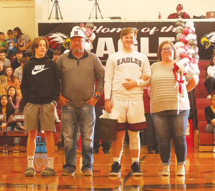 Huntsville High School held its annual Colors Night last week to honor senior athletes, cheerleaders and managers. The Eagles and Lady Eagles hosted the Berryville teams for the event last Friday.  Senior Eagles honored were Kyle Garrison, Kent Mayes, Devan McDaniel, Kolton Shepherd and Bryan Walden. Boys basketball managers honored were Alyssa Ogden and Brittany Shrum. Senior Lady Eagles honored were Madison Phillips, Kendra Poor and Josie Sisk.  Senior cheerleaders were Raina Nalley and Makayla Parsons. Parents escorted the students honored onto the floor at Charles H. Berry Gymnasium.