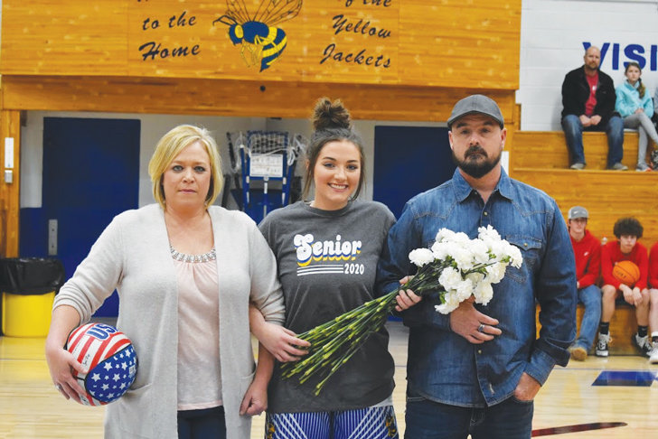 Taylor Cott and parents Chad and Elaine Dickey.