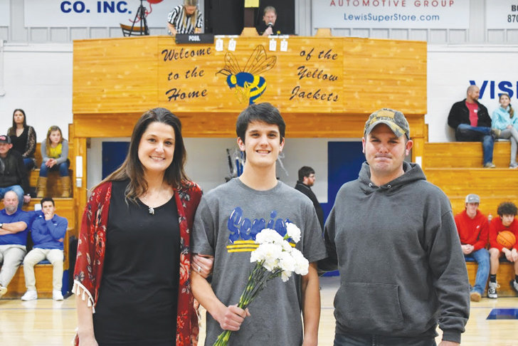 Will Clark and parents Brandon Clark and Heather Howard.