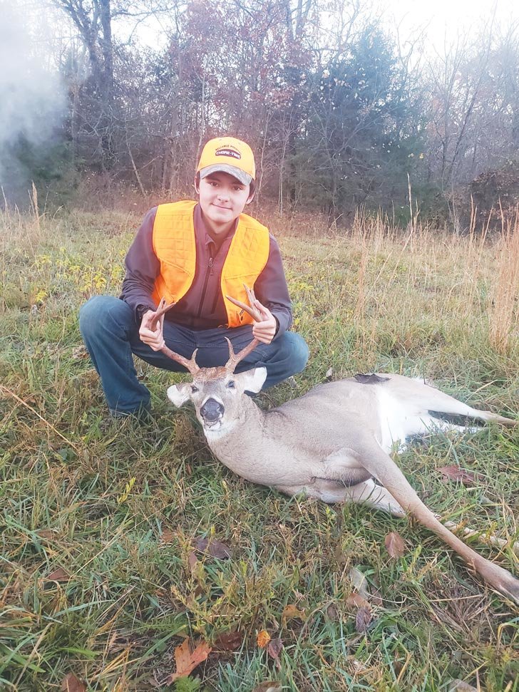 Christopher Scates, 15, killed his deer at Whorton Creek.
