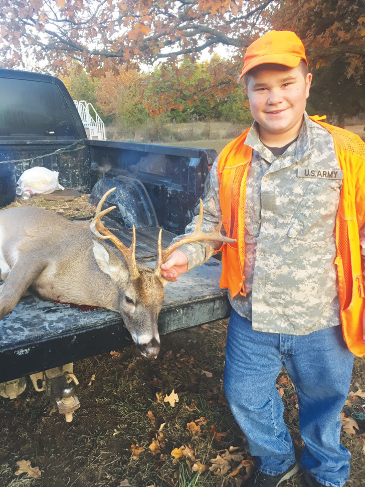 Thomas Smallman, 12, killed an 8-point buck on Bohannan Mountain.
