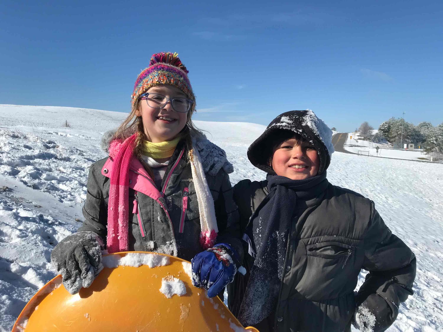 Mckenna and Isaiah Moore spent the day sledding.