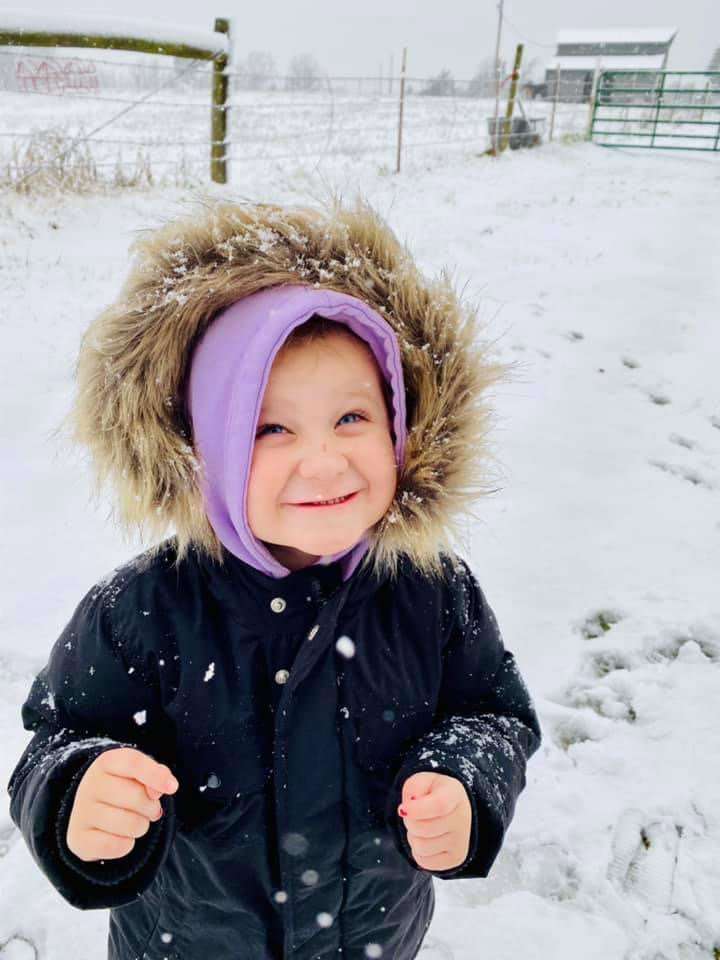 Nova Claire Farley loved her first snow.