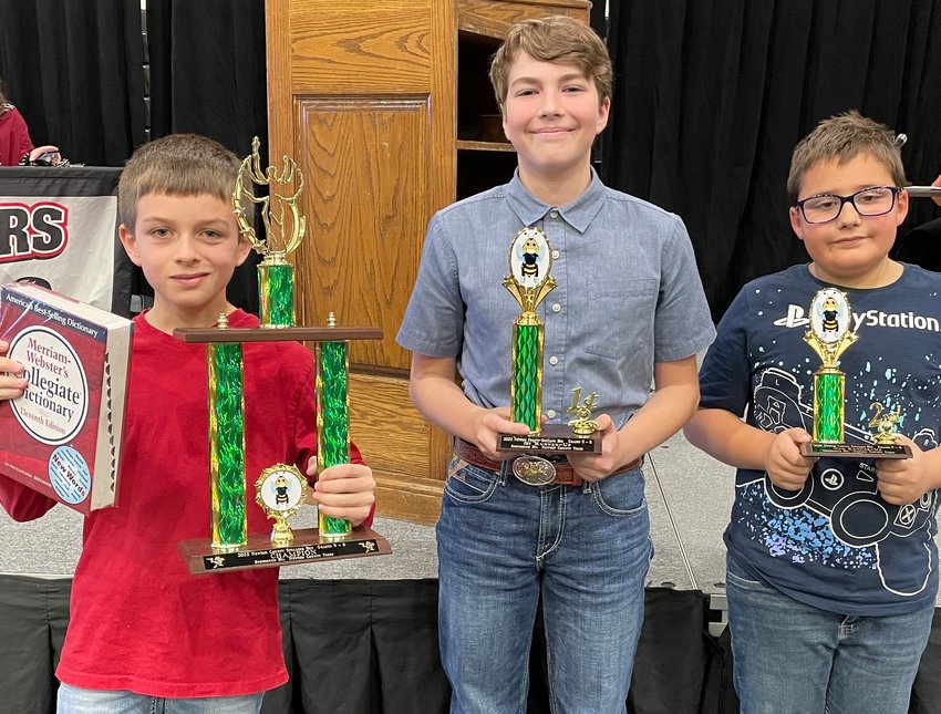 From left, winners of the 2022 Newton County Spelling Bee held at North Arkansas College Pioneer Pavilion, Thursday afternoon, Jan. 13, First place, Brant Davis, 9, fourth grade, Jasper School; first runner-up, Grady Hankins, 11, sixth grade, Jasper School; second runner-up Jordan Sams, 10, fourth grade, Jasper  School.