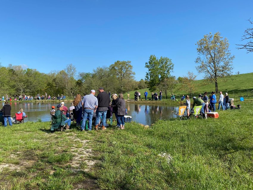 Anglers surrounded the Compton Pond for last week's fishing derby.