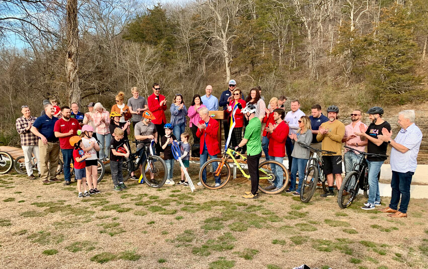The Harrison Regional Chamber of Commerce hosted a &ldquo;Ribbon Cutting&rdquo; event for the new Creekside Bike Trail along Crooked Creek on Wednesday, Feb. 20th. The City of Harrison and H.E.A.R.T. (Harrison, Exercise,  Adventures, Recreation, Trails) partnered to open a new bike trail along Crooked Creek as part of the Creekside Complex. Jagged Axe Trail Designs designed and constructed the Creekside Bike Skills Trail. That includes about 6/10 of a mile with several features adjacent to Crooked Creek and the current walking trail.