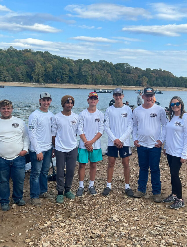 Robinson&rsquo;s first fishing team on the shore of Beaver Lake in fall 2022 after their first bass tournament.