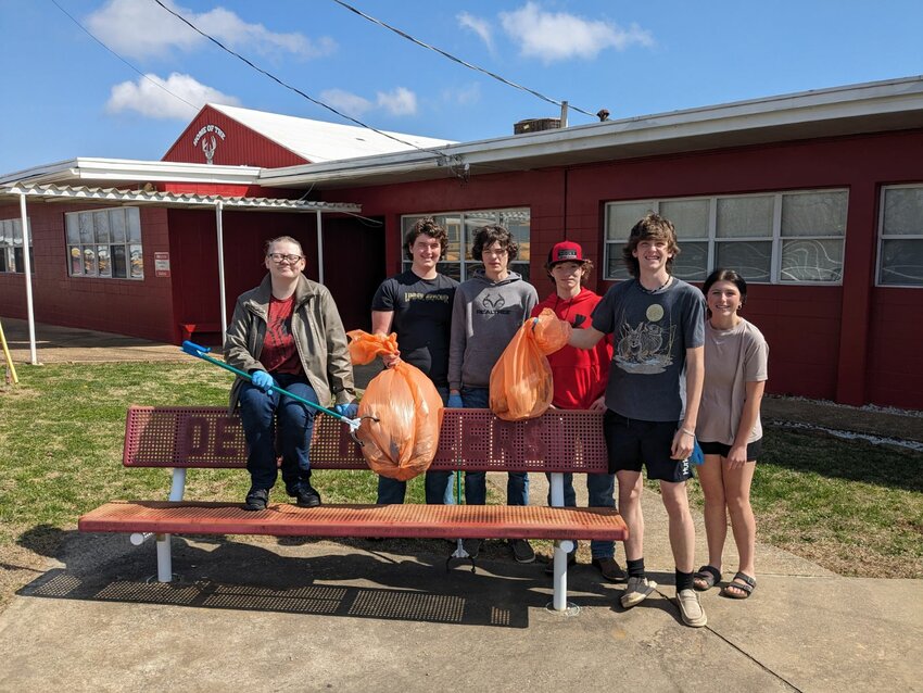 Deer School Students have begun policing the school grounds picking up trash as part of the annual Newton County Clean-up. Pictured from left are, Taelah Perkins, Dillon Young, Hyatt Gilmore, Nicholas Villano, Ayden Burdine and Brecken Bushea.