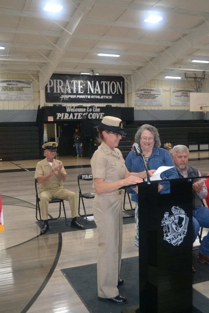 Deana Bess, in uniform, gave the formal introduction of the Newton County veteran randomly selected as the featured veteran for the event, Chief Warrant Officer (ret.) Kimberly D. Lore, of Jasper.