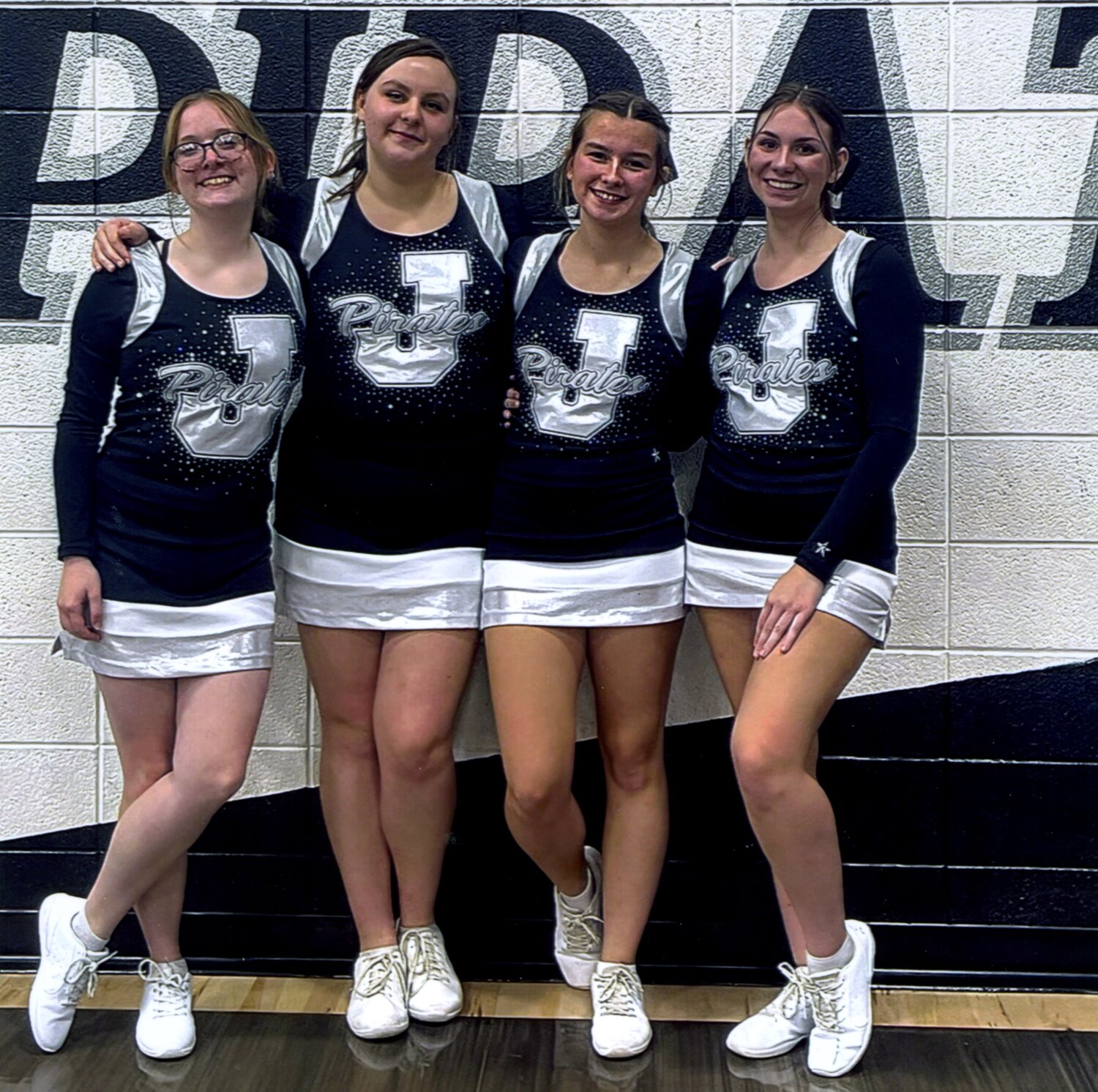 Jasper Cheerleading members, from left,  Bailey Kolb, Carly Moore, Jaylen Cone and Mariah Joiner, will perform with Varsity Spirit All Americans Dec. 4-9 during events observing the 82nd anniversary of the attack on Pearl Harbori in Honolulu, Hawaii. The events include a parade having the theme, "Remembering the Past and Celebrating Our Future." Veterans and their families will be honored while recognizing that once bitter enemies can become loyal friends and allies. The girls were selected as Varsity Spirit All-Americans during the University of Central Arkansas Camp held at Jasper High School over the summer. "We are thrilled these excellent athletes will have the chance to perform and experience our Special Events in Honolulu," said Bill Seely, president of Varsity Spirit.