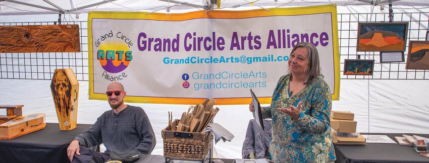 Randy Rhodes and Cassidy Finn at the Grand Circle Art Alliance during the 2023 Page Balloon Regatta Street Fair.
