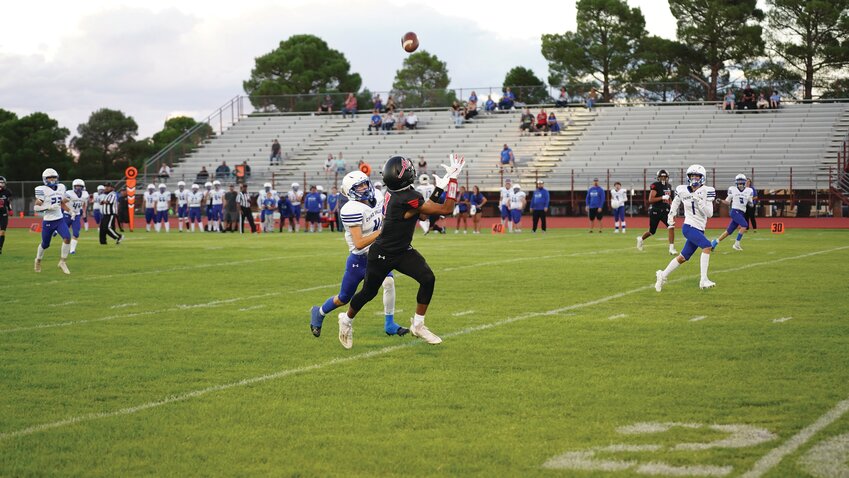 Tyree Stingley hauls in a pass from Joey Benally. Stingley had three receiving touchdowns.