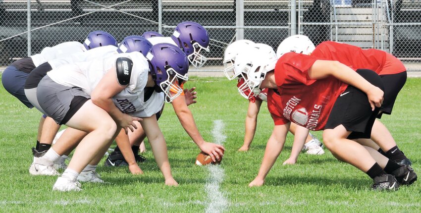 The Rochelle Hub football team held a combined practice and 7-on-7 scrimmage with the Forreston Cardinals on Tuesday morning.