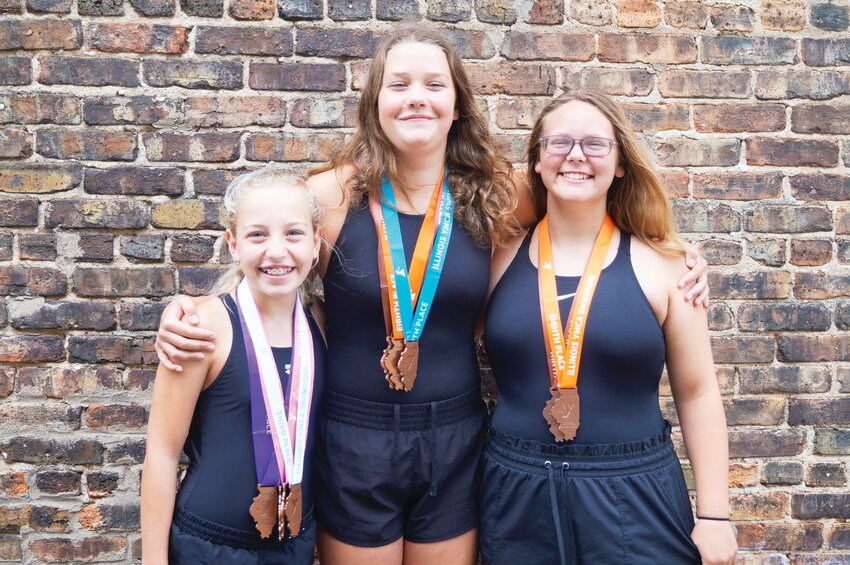 Clara Lofthouse, Sydney Burke and Josie Slattengren represented Rochelle in the 2024 Illinois YMCA Long Course State Swim Championships in St. John, Indiana from July 12-14.