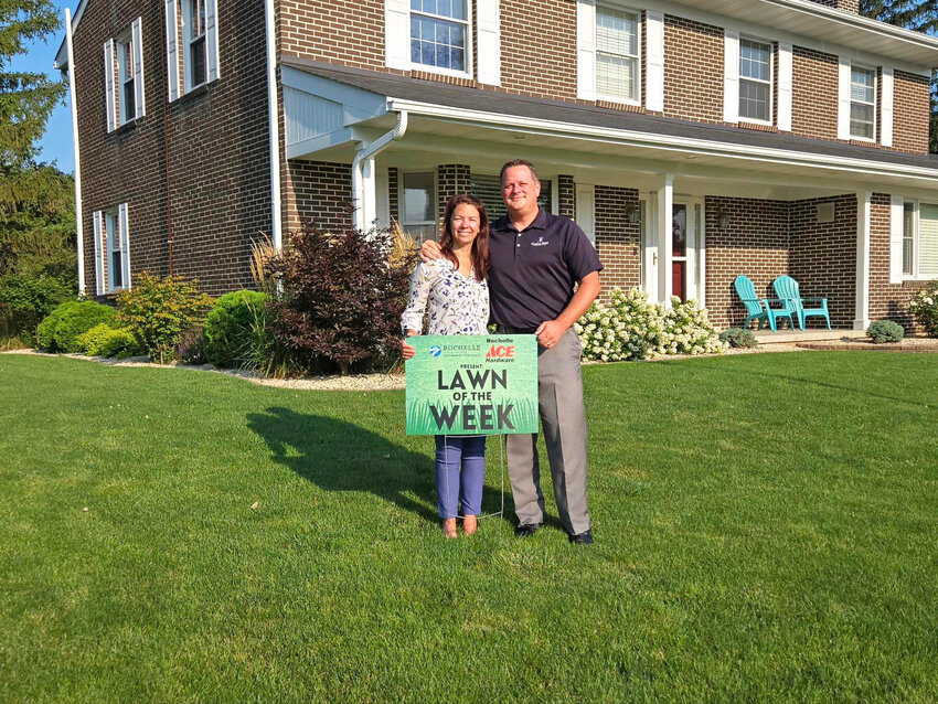 The Rochelle Chamber of Commerce recently presented its Lawn of the Week award for the week of July 25 to Dale and Megan Wells. They received a sign and a $25 Rochelle ACE Hardware gift card, presented by Rochelle Ace Hardware Manager Jesse Lopez.