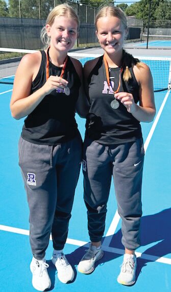 Seniors Natalie Wagner (left) and Sydney Carmichael (right) medaled in second place at No. 4 doubles during the Harlem Invitational on Saturday.