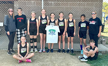 The Northbrook Middle School cross country runners participated in the IESA Cross Country Sectional on Oct. 12 at Dunlap. Sitting, left, is Lumen Setchell, and right, Aisaac Arteaga. Standing, left to right, are coach Heather Friedlein, Averie Hazelwood, Evelyn Sims, London Jones, Aliya Delao, Graci Bloomfield, Harper Stamberger, Aliya Eames and coach Hanna Gallagher. (Photo contributed)