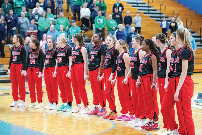The Stillman Valley Cardinals take the floor before their IHSA 2A Super Sectional against Peoria Notre Dame on Monday evening.