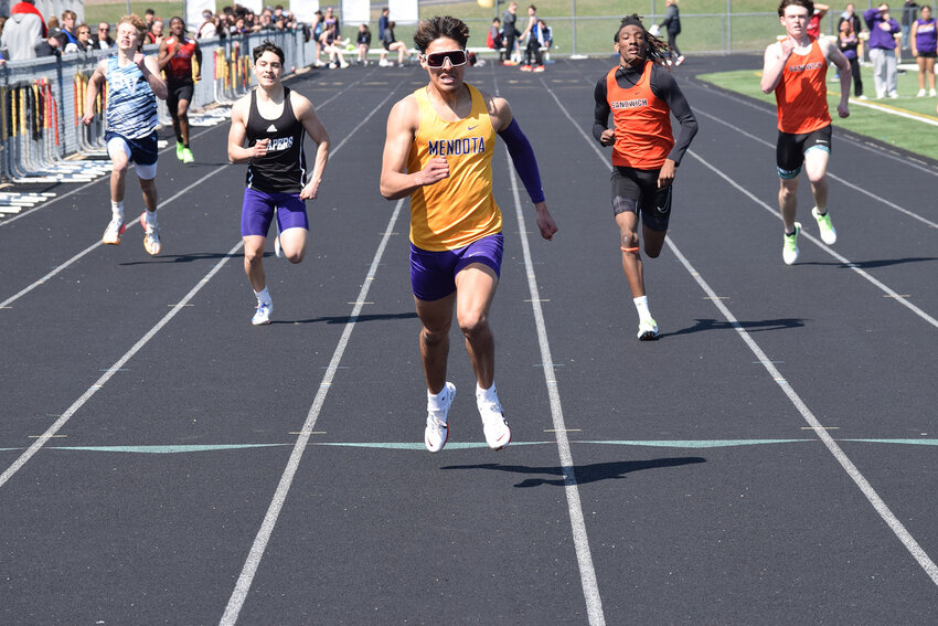 Mendota’s Sebastian Carlos leaves the rest of the field in the dust on his way to a first-place finish in the 400-meter dash in the Don Gooden Invitational on April 12 at Mendota. (Reporter photo)