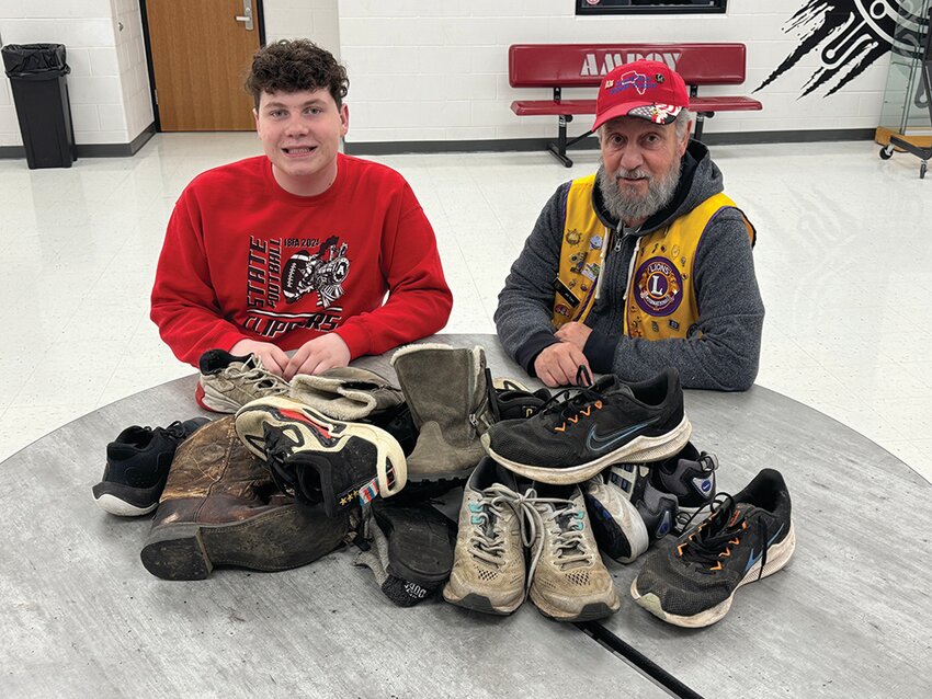 Amboy Leos President Micah Miller, left, and Amboy Lions Jim Travi, as well as both organizations, are asking you to bring in your old shoes to recycle in part of gotsneakers?, a Sneaker Recycling Program by the Lions of the Illinois Foundation. Shoes can be dropped off at the Amboy High School main office through May.