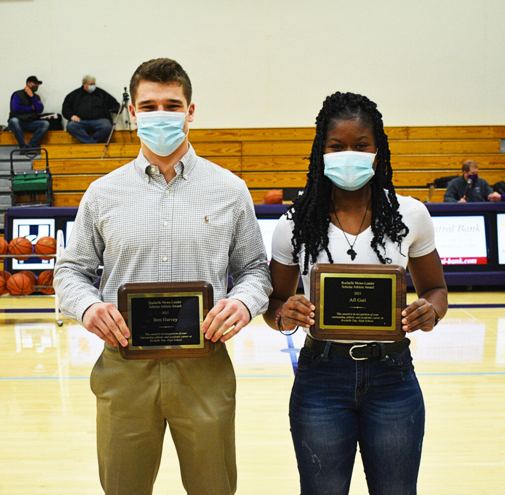 Rochelle Township High School graduates Ben Harvey (left) and Afi Gati (right) were recognized with the 2020-21 Rochelle News-Leader Scholar-Athlete Awards during Monday's varsity basketball game. (Photo by Russell Hodges)