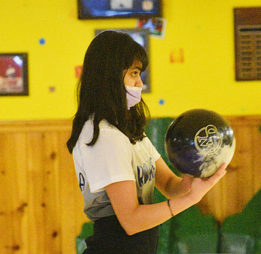 Junior Aarchi Sorathia prepares for a shot during the Rochelle Lady Hub varsity bowling match against Oregon on Monday. (Photo by Russell Hodges)