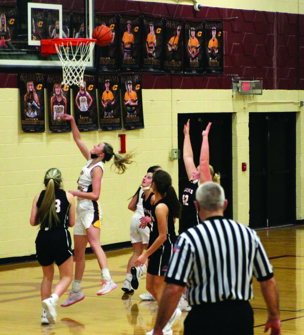 Marc Rogers / Journal — 
Mallory Cyrulik (#4) drives to the basket for 2 points in the varsity game.