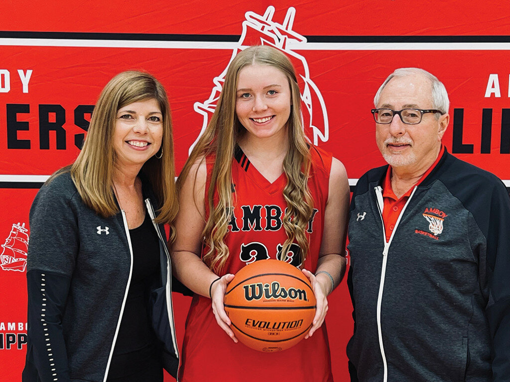 Pictured above are Assistant Coach Shauna Dinges, Olivia Dinges, Head Coach Mike McCracken - three generations of family together on the basketball court. 
Photo courtesy of Shauna Dinges